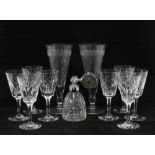 A set of eight crystal wine glasses , a pair of champagne flutes and a glass scent atomiser (a lot)