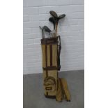 Set of vintage left handed golf clubs with canvas golf bag, (a lot)