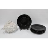 A white glazed tureen and cover and set of eight large black glazed plates (9) 34cm.