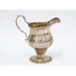 Edwardian silver cream jug, London 1903, Georgian style with engraved family crest, 12cm