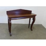 Late 19th / early 20th century mahogany ledge back table, cabriole front legs, 112 x 130 x 45