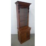 19th century mahogany bookcase cabinet, stepped cornice over a single glazed door with leaf