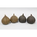 Set of four studio pottery garlic shaped bulbs with incised decoration (4) 8cm.
