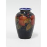 Moorcroft Pomegranate vase, blue ground and impressed marks, 9.5cm.