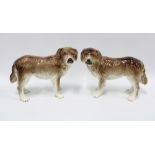 Pair of Staffordshire dogs, modelled standing with gilt collars, (one a/f) (25 x 35cm) (2)