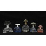 Five Art Deco style glass scent bottles to include two blue bottles one pink and two in clear glass,