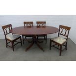 Set of four mahogany Georgian style dining chairs and a reproduction oval mahogany dining table on