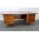 Scandinavian style mid century desk, rectangular top over pull out slides and an arrangement of five