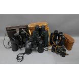 Five binoculars, three with leather carry cases (5)