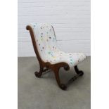 Child's mahogany slipper chair, upholstered in a white and multi coloured fabric, 63 x 40cm