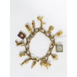 9ct gold charm bracelet with thirteen yellow metal charms, six of which are stamped as 9ct gold