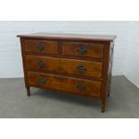 Early 20th century walnut and mahogany chest, the rectangular top above two short and two long