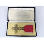 The Most Excellent Order of the British Empire (OBE) medal, WWII era with ribbon and box