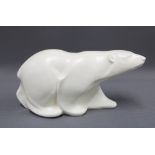 Early to mid 20th century polar bear, white / cream glazed, unmarked 17 x 30cm