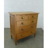 Early 20th century light oak chest, the moulded rectangular top above two short and three graduating