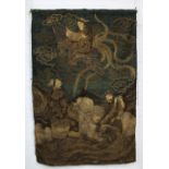 An antique Chinese embroidered tapestry wall hanging depicting Immortals and a phoenix, 125cm