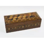 Cube parquetry box, rectangular form, hinged lid with blue silk lined interior, 8 x 26cm