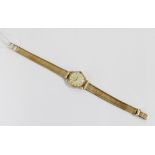 Ladies gold Omega wristwatch on a 9ct yellow gold bracelet strap