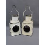 Pair of cream painted railway lanterns, marked B.R (W) and B.R. (M), 53cm