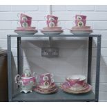 19th century tea set pink and white ground painted with floral sprays with gilt highlighted borders,