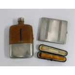Birmingham silver cigarette case, a leather and Epns mounted hip flask and a cased amber cheroot