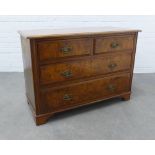 Burr walnut chest, the rectangular top above two short and two long drawers on bracket feet. 75 x