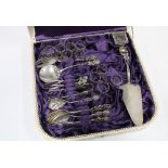 Continental silver pastry set with various spoons, serving spoons and cake slice and small forks,
