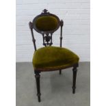 Victorian side chair with an oval padded back above a classical urn splat, stuffover upholstered