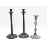 Pair of fluted candlesticks with metal sconces, 33cm, together with a silver plated candlestick (3)