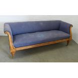 19th century walnut three seater settee with scroll arms and turned legs, terminating on brass