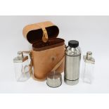 Contemporary leather cased set with thermos flask and angular glass bottles, 26 x 20cm