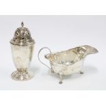 Early 20th century silver sauce boat, hallmarks and a silver sugar castor, rubbed hallmarks (2)