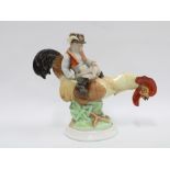 Herend figure of a boy riding a rooster, 28cm