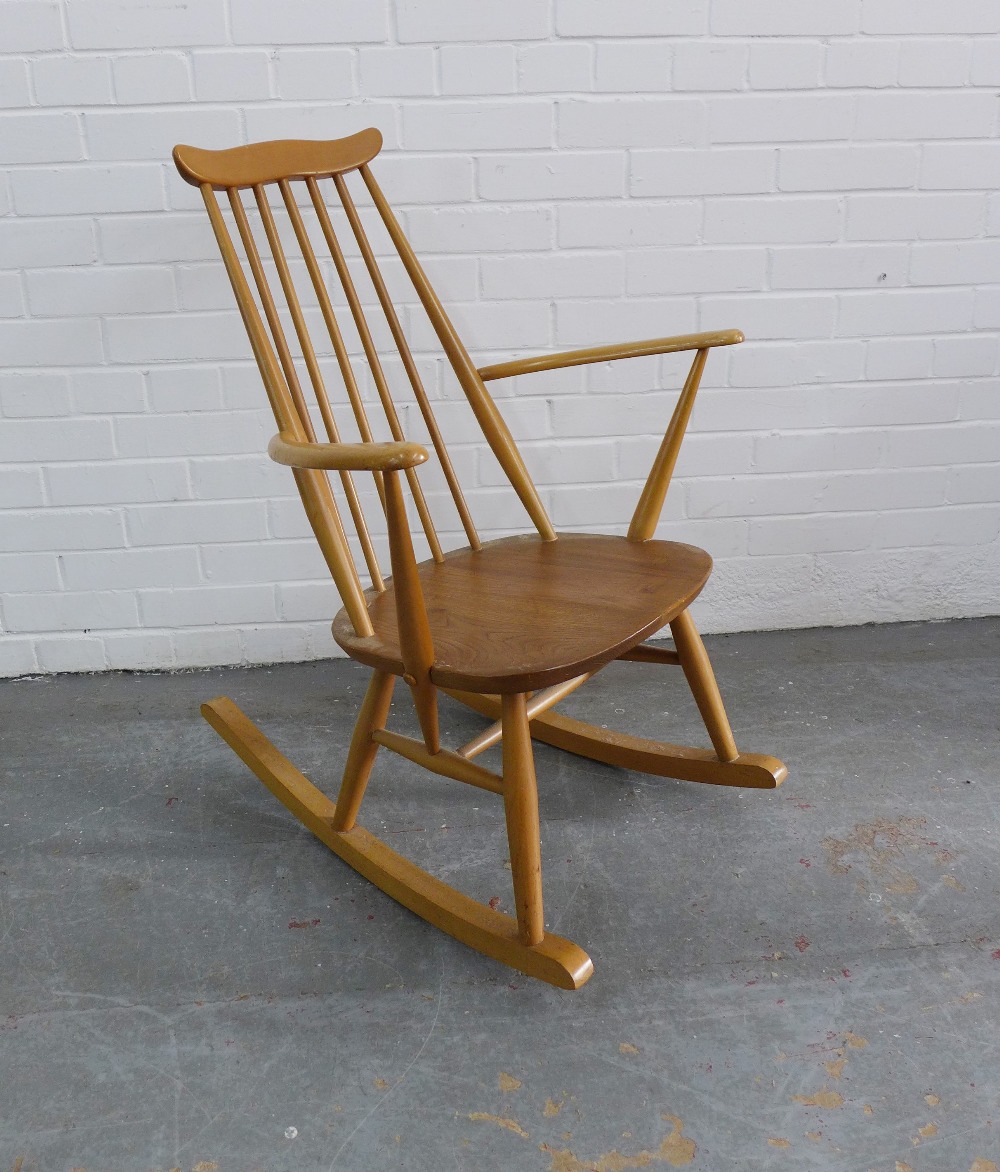 Ercol blonde elm rocking chair, 86 x 62 x 41cm.