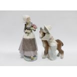 Lladro figures ‘Platero and Marcelino’ No.1180 and another of a girl with flowers, taller 25cm (2)
