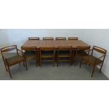 A.H. McIntosh teak extending dining table and set of ten chairs. 73 x 241 x 90cm. (11)