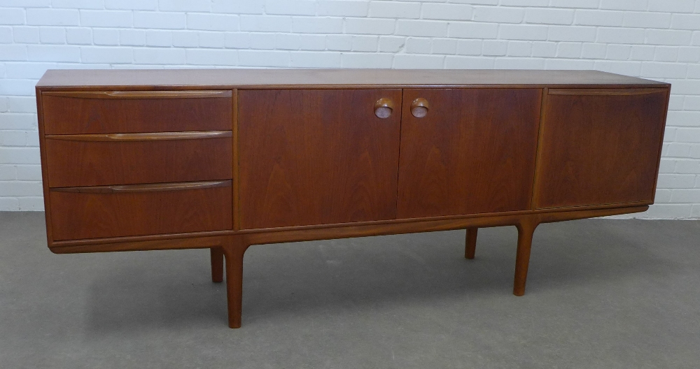 A.H. McIntosh, teak sideboard with a pair of cupboard doors, flanked on one side to a fall front,