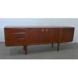 A.H. McIntosh, teak sideboard with a pair of cupboard doors, flanked on one side to a fall front,