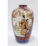 Imari vase typically decorated with figures blossom and foliage, etc 30cm.