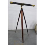 19th century brass telescope and mahogany tripod stand, 163 x 102cm. (2)