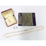 Single strand of cultured pearls with a 9ct gold fitting, purchased from Liberty, London and a