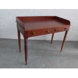 Mahogany ledge back desk/table with two short drawers, bun handles and ring turned tapering legs, 83