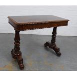 19th century rosewood table, the rectangular top with gadrooned edge, over two short frieze drawers,
