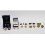 A large collection of silver, white metal and gilt metal cufflinks and tie clips, retailed by