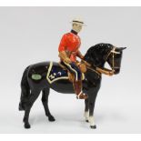 Beswick figure of a Canadian Mountie on horse, a/f with restoration of a neck break, 21cm