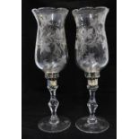 A pair of etched glass storm lantern style candlesticks with silver plated bases (2) 37cm.