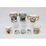 A collection of Royal Commemorative porcelain tankards, loving cups and trinket jars with covers, (