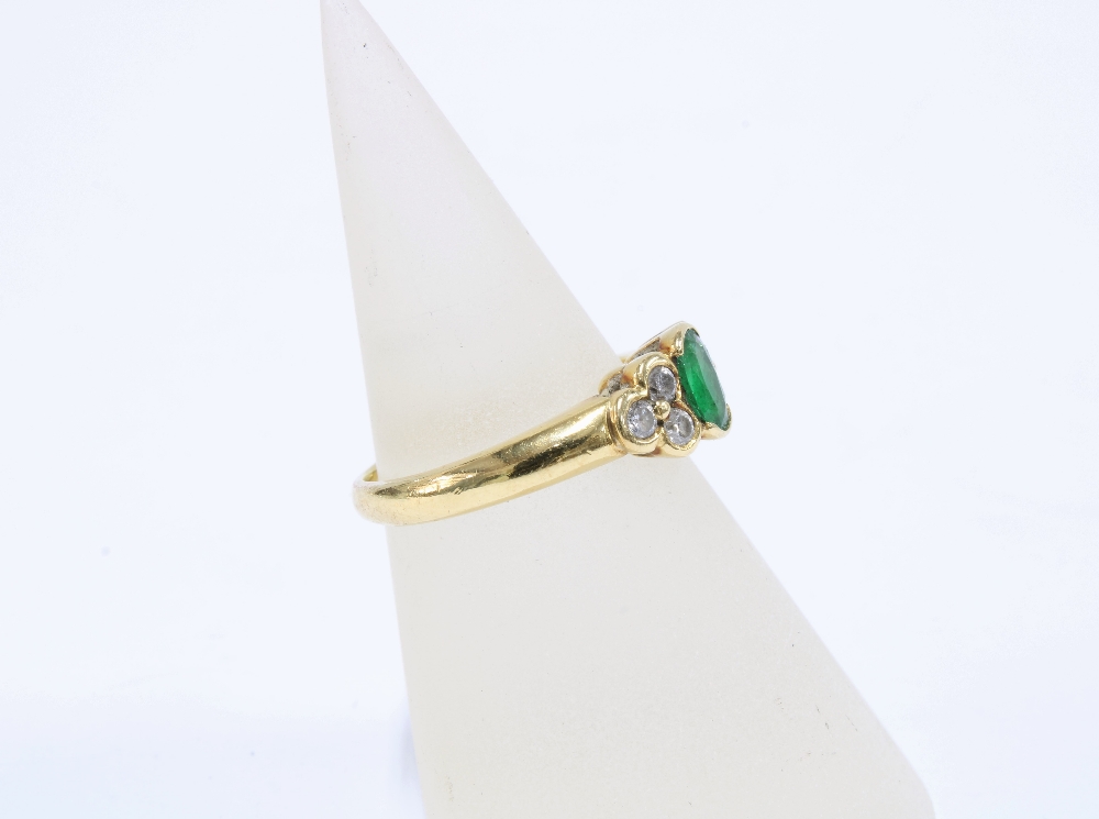 18ct gold emerald & diamond dress ring, with an oval emerald flanked by three bright cut diamonds, - Image 2 of 4