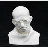 White glazed pottery bust of Mahatma Gandhi, 14cm