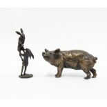 Miniature bronze group of two hares, makers mark DM, 7cm high and a bronze pig, (2)